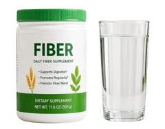 fiber-supplement-with-water fiber supplement container next to a glass of water for proper fiber intake